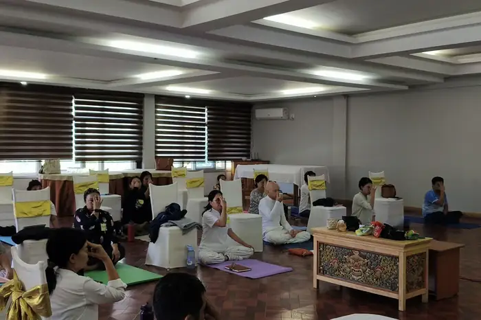 Guiding the group through a practice, Thimphu.